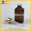 Wholesale empty flat shoulder amber color glass body lotion bottle